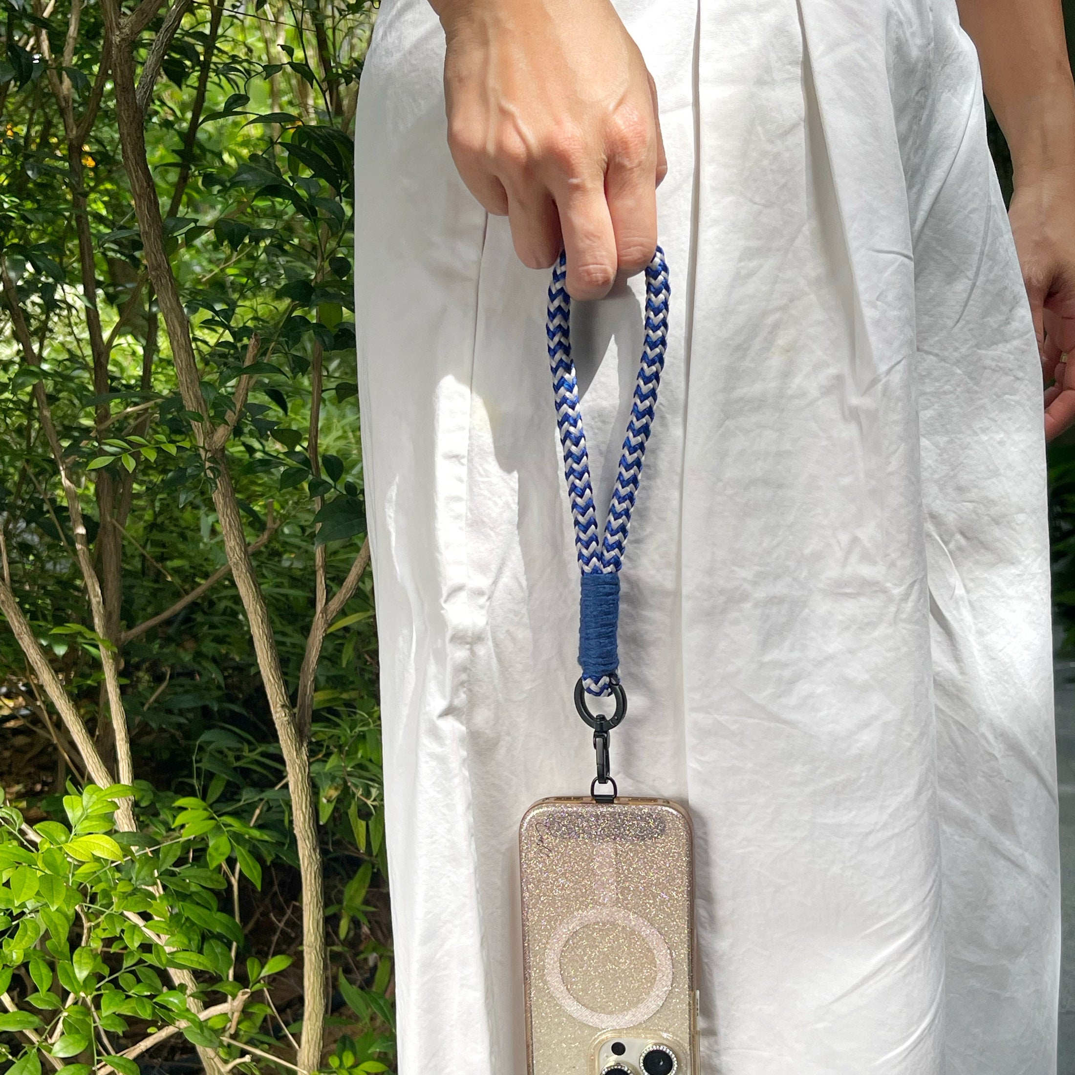 (Blue/grey) Holding phone wristlet